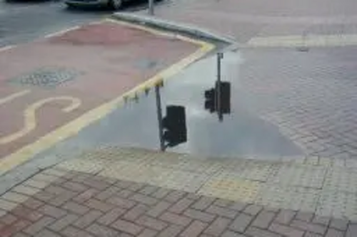 Puddle in Epsom High Street