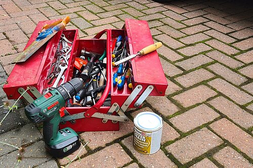 Red toolbox with tools