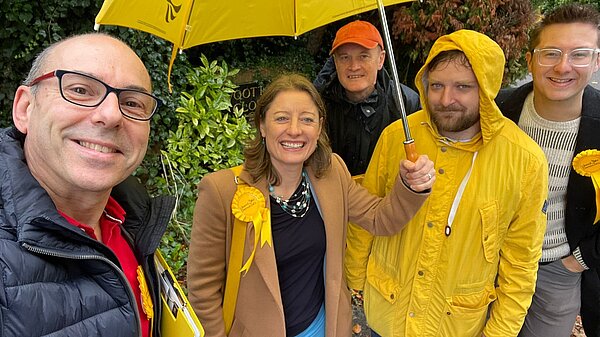 Volunteers Out and About Canvassing in the rain